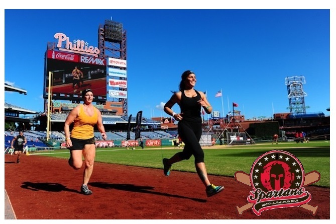 Runners_on_warning_track_with_Cargo_net